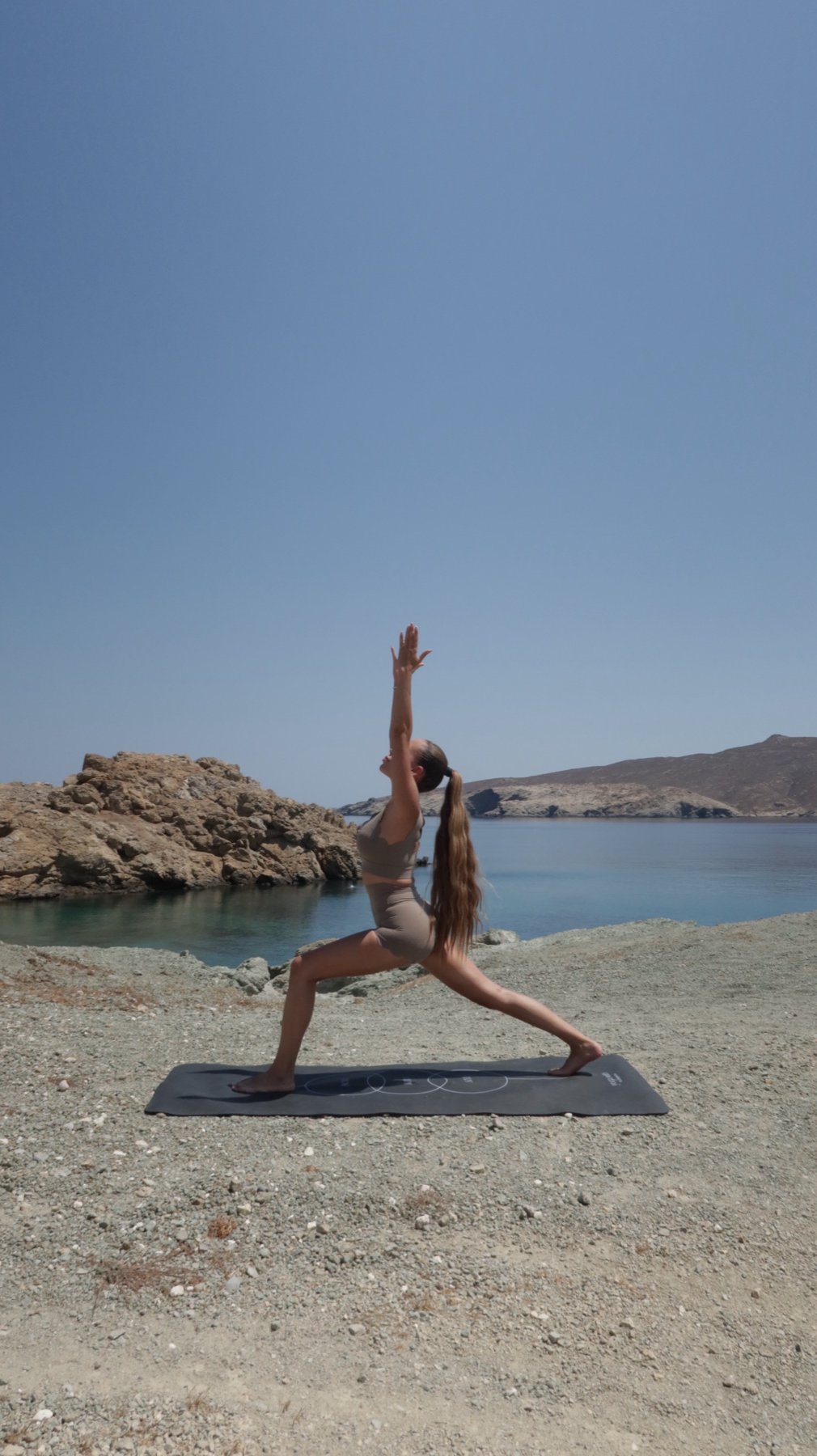 Yoga practice on a quiet cove in Mykonos